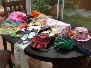 Photo of various craft project prototypes on a table.