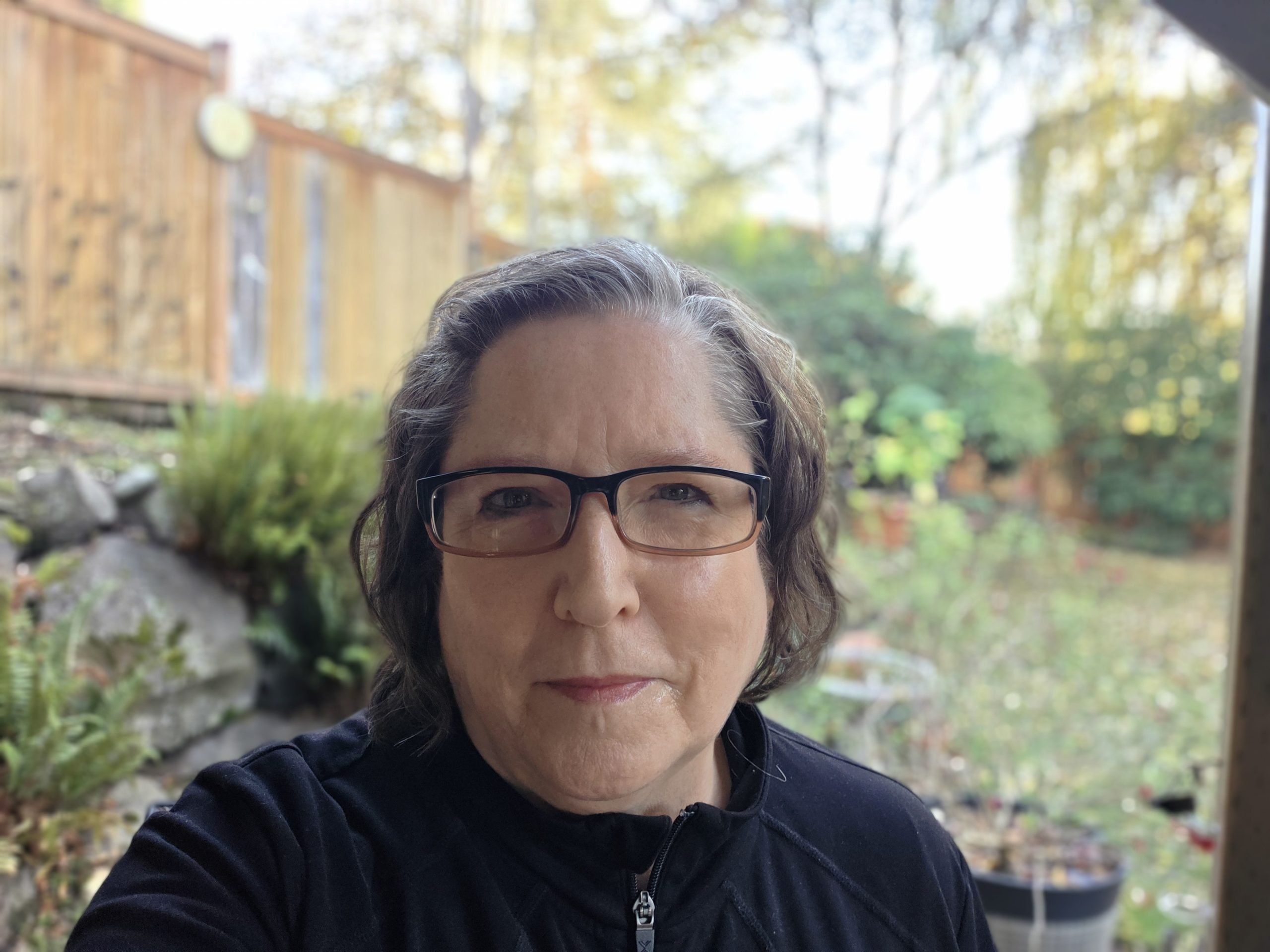 Photo of author Jennifer Phillips in her back yard